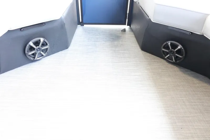 Slide: The Image of Interior of 2025 Lowe SS 230 DL boat with speakers and seating. - 34