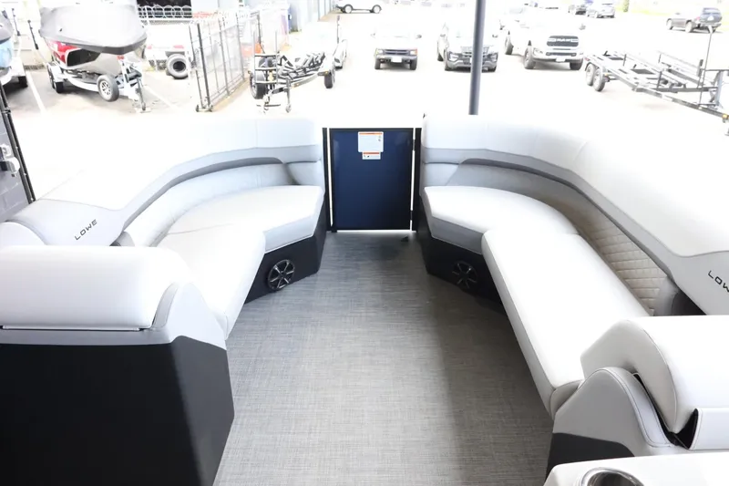 Slide: The Image of 2025 Lowe SS 230 DL boat interior with spacious seating and modern design. - 36