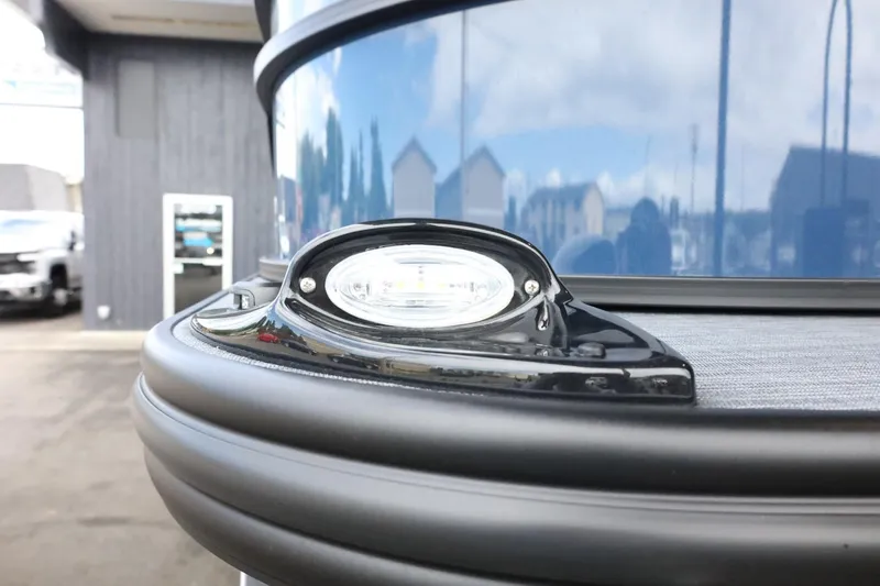 Slide: The Image of 2025 Lowe SS 230 DL boat detail with sleek design and modern light fixture. - 37