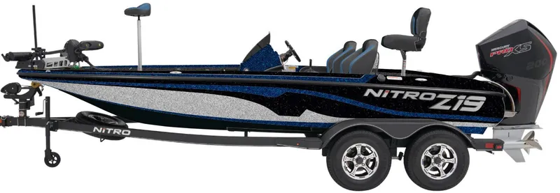 Slide: The Image of 2025 Nitro Z19 Pro fishing boat with trailer, sleek design, dual seats, and powerful outboard motor. - 1