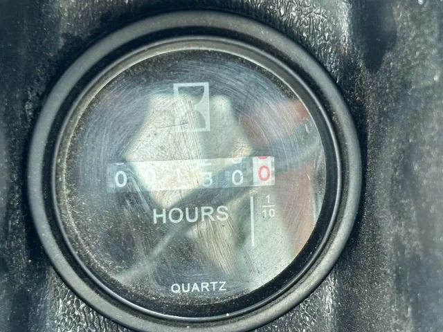 Slide: The Image of Hour meter showing 136.0 hours on a 2018 Cobalt 220S. - 15