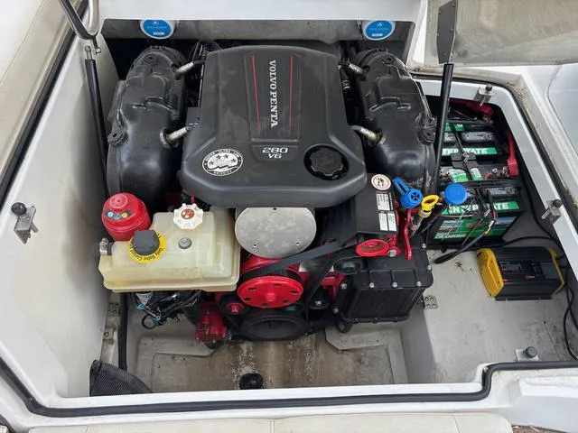 Slide: The Image of 2018 Cobalt 220S boat engine compartment with Volvo Penta 260 V6 engine. - 16