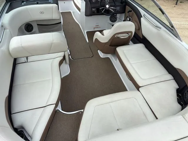 Slide: The Image of Interior of a 2018 Cobalt 220S boat with white and brown seating. - 8