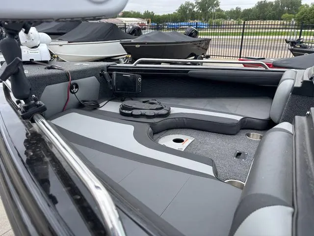 Slide: The Image of Interior of 2022 Lund 1975 Tyee Sport boat, featuring spacious seating and modern design. - 15