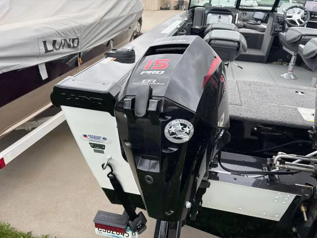 Slide: The Image of Lund 1975 Tyee Sport 2022 boat with 15 HP EFI Pro outboard motor. - 4