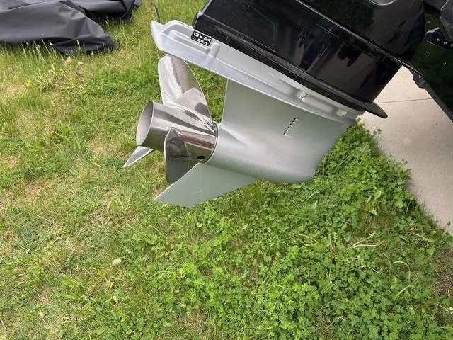 Slide: The Image of Propeller of 2022 Lund 1975 Tyee Sport boat on grass. - 6