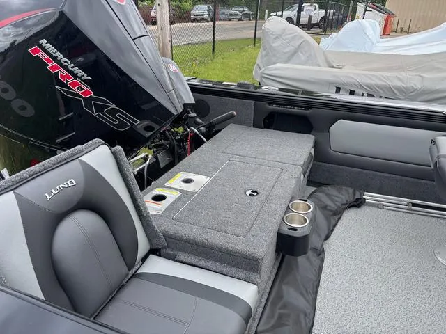Slide: The Image of Interior of 2022 Lund 1975 Tyee Sport boat with Mercury Pro XS engine. - 8