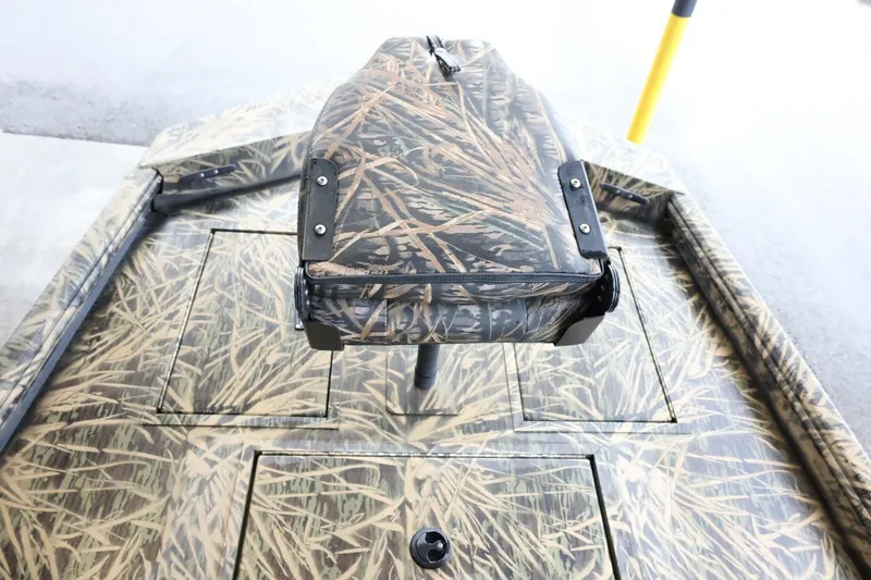 Slide: The Image of 2023 Lowe Roughneck 1760 Pathfinder boat with camouflage pattern deck. - 14