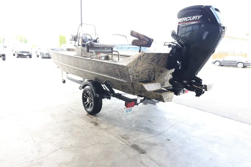 Slide: The Image of 2023 Lowe Roughneck 1760 Pathfinder boat with Mercury outboard motor on trailer. - 6