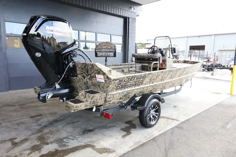 Slide: The Image of 2023 Lowe Roughneck 1760 Pathfinder boat with camouflage design and Mercury outboard motor. - 8