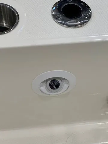 Slide: The Image of 2025 Boston Whaler 210 Vantage boat detail with cup holder and fixture. - 11