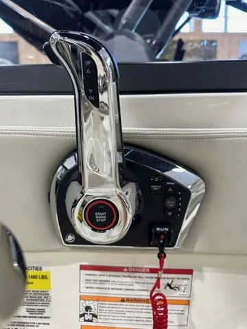 Slide: The Image of Control panel of 2025 Boston Whaler 210 Vantage boat with start/stop button. - 14