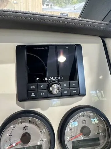 Slide: The Image of Control panel of 2025 Boston Whaler 210 Vantage with JL Audio system and gauges. - 15
