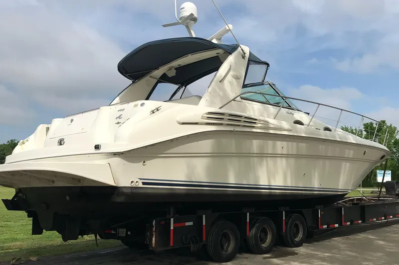 Slide: The Image of 1998 Sea Ray 400 Sundancer yacht on trailer, ready for transport. - 2