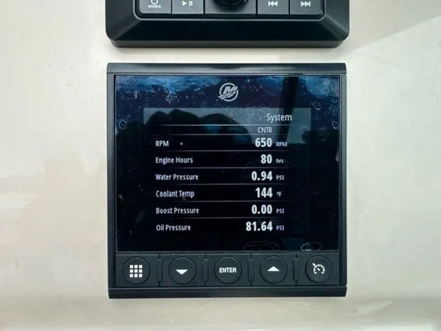 Slide: The Image of Display screen showing engine metrics on a 2023 Boston Whaler 240 Vantage boat. - 20