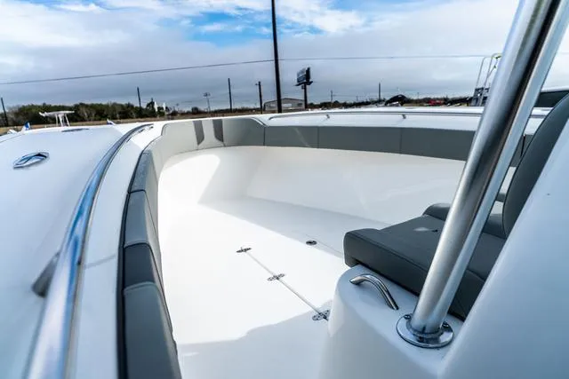 Slide: The Image of 2025 Cape Horn 31T boat interior with sleek seating and modern design. - 13