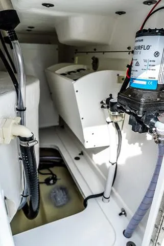 Slide: The Image of Interior view of 2025 Cape Horn 31T boat, showcasing mechanical components and wiring. - 18