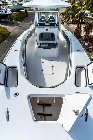 Slide: The Image of 2025 Cape Horn 31T boat with open deck and storage compartments. - 21