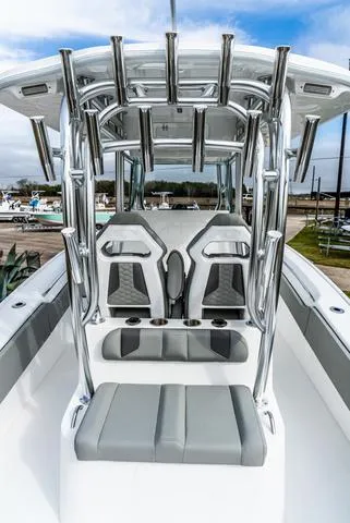 Slide: The Image of 2025 Cape Horn 31T boat interior with sleek seating and rod holders. - 5