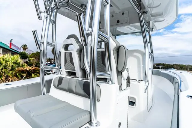 Slide: The Image of 2025 Cape Horn 31T boat interior with sleek seating and polished metal framework. - 6