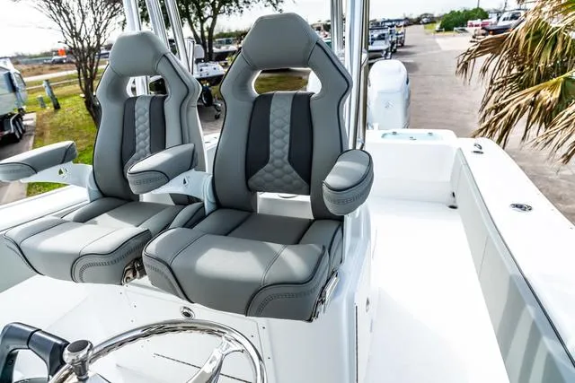 Slide: The Image of 2025 Cape Horn 31T boat with luxurious gray seating and sleek design. - 7