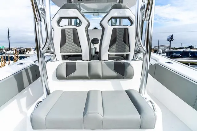 Slide: The Image of 2025 Cape Horn 31T boat interior with modern seating and sleek design. - 8