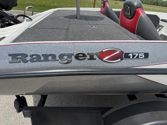 Slide: The Image of 2019 Ranger Z175 boat with red and gray seating, close-up of logo and deck. - 25