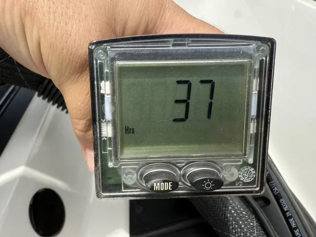 Slide: The Image of Digital hour meter displaying 37 hours on a 2019 Ranger Z175 boat. - 26