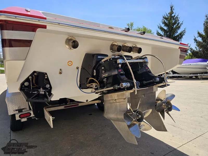 Slide: The Image of Rear view of a 2007 Donzi 38 ZR boat with dual propellers and Mercury engines. - 30