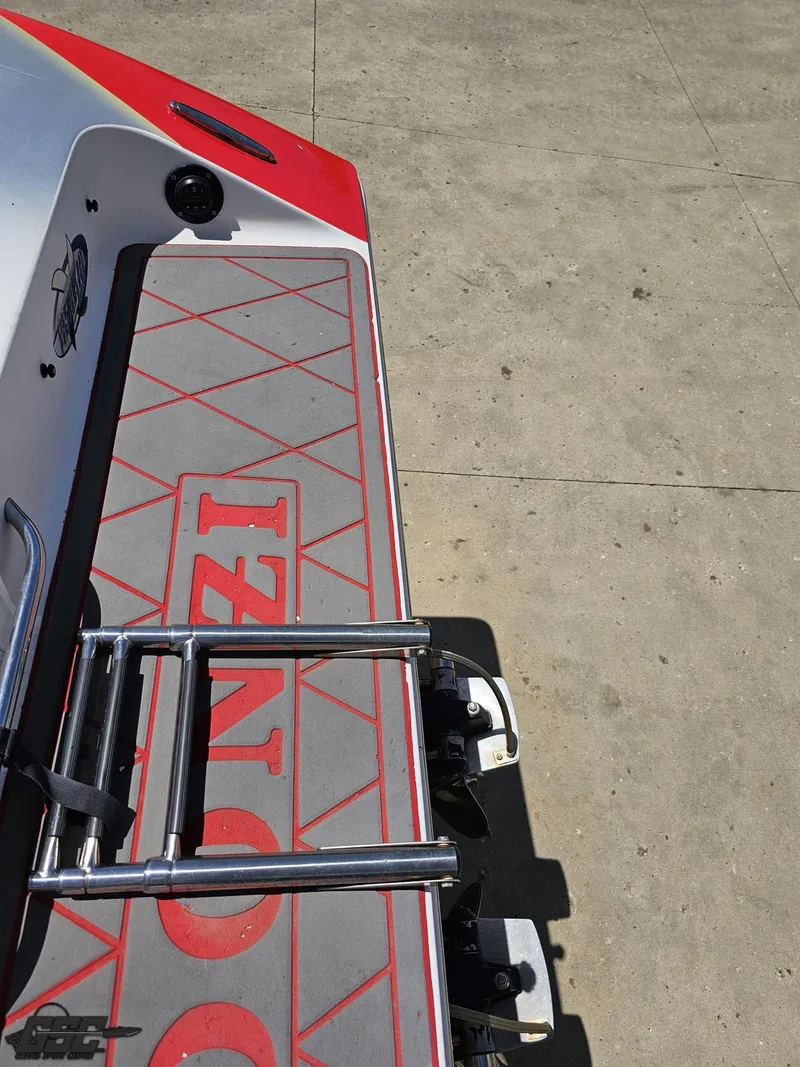 Slide: The Image of 2007 Donzi 38 ZR boat deck with ladder and red accents. - 34