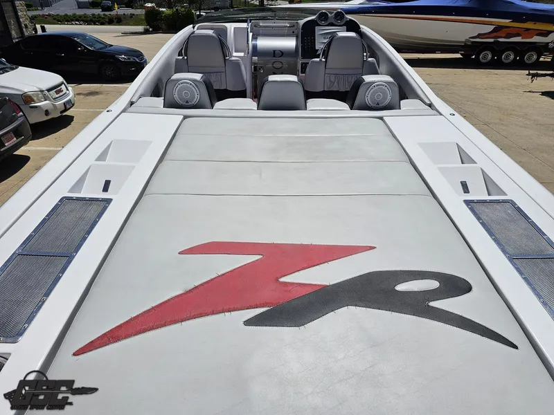 Slide: The Image of 2007 Donzi 38 ZR speedboat interior with logo, featuring sleek design and modern controls. - 37