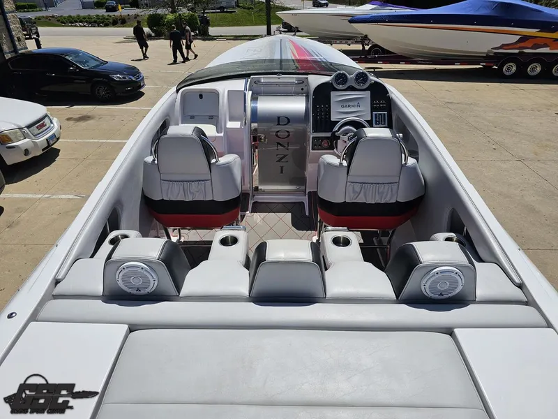 Slide: The Image of 2007 Donzi 38 ZR speedboat interior with dual seats and dashboard controls. - 39