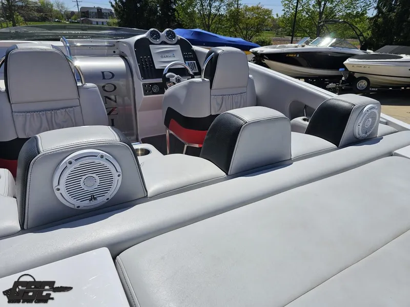 Slide: The Image of 2007 Donzi 38 ZR boat interior with sleek seating and modern dashboard. - 41