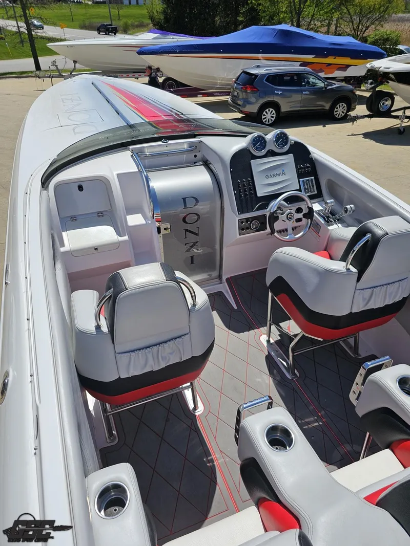 Slide: The Image of 2007 Donzi 38 ZR speedboat interior with sleek design and modern controls. - 42
