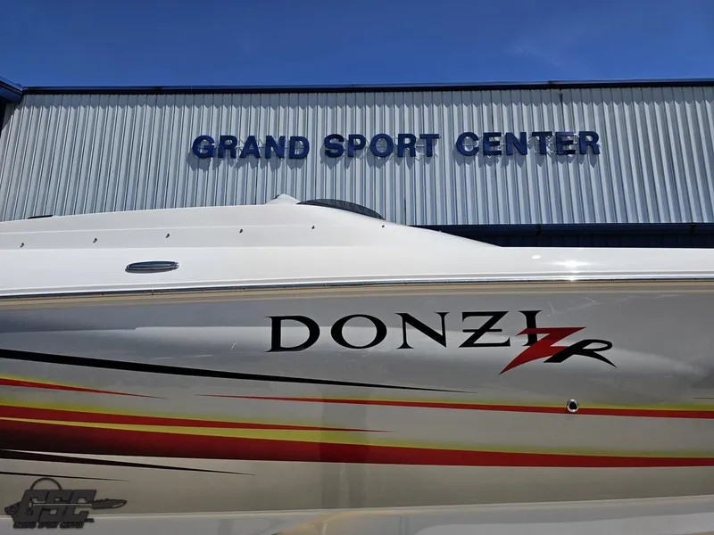 Slide: The Image of 2007 Donzi 38 ZR boat at Grand Sport Center, featuring sleek design and vibrant graphics. - 5