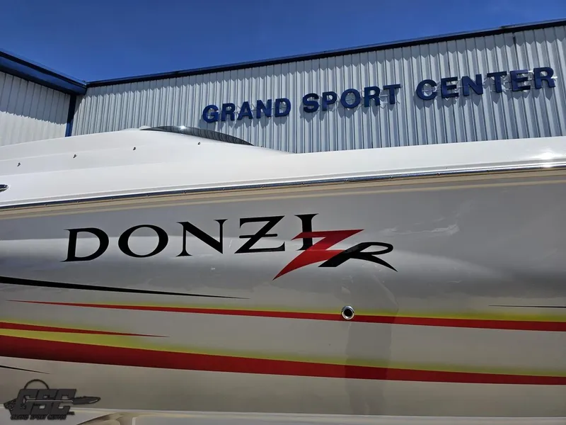 Slide: The Image of 2007 Donzi 38 ZR boat at Grand Sport Center, featuring sleek design and vibrant graphics. - 8