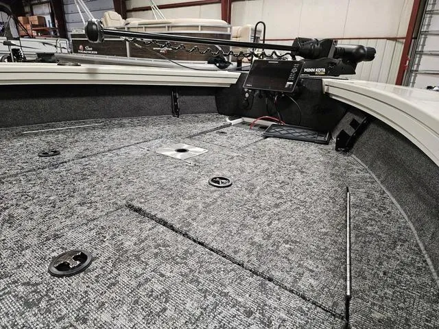 Slide: The Image of 2025 Ranger VX1988 WT boat interior with advanced trolling motor and spacious deck. - 4