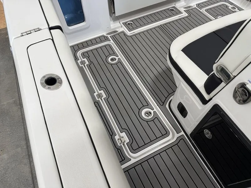 Slide: The Image of 2025 Tidewater 282 CC Adventure boat deck with sleek, modern design and high-quality materials. - 26