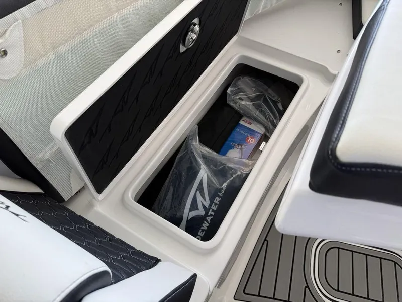 Slide: The Image of Storage compartment on 2025 Tidewater 282 CC Adventure boat, featuring sleek design and practical space. - 8