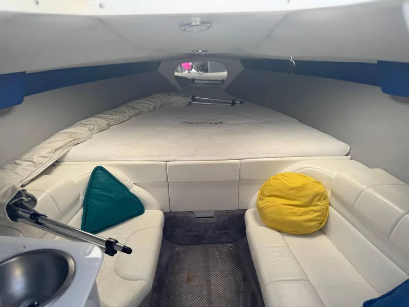 Slide: The Image of Interior of 2000 Formula 271 FASTech boat with seating and bed. - 11