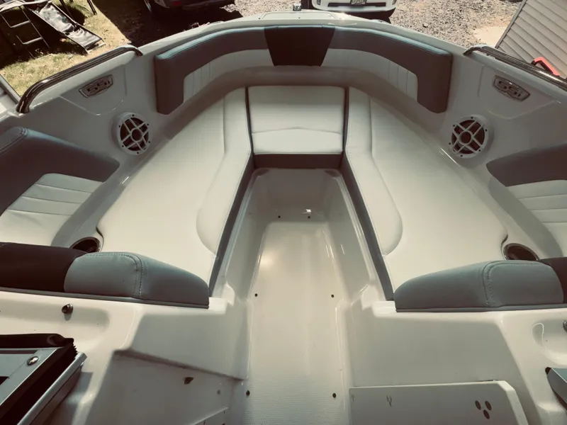 Slide: The Image of 2023 Chaparral 21 SSi OB boat interior with spacious seating and modern design. - 17