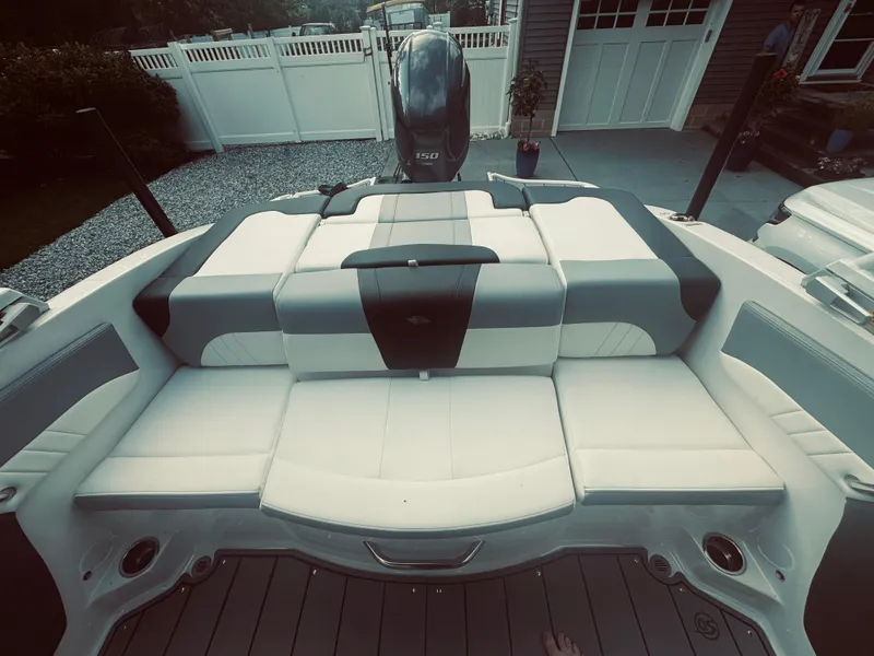 Slide: The Image of 2023 Chaparral 21 SSi OB boat with spacious seating and modern design. - 28