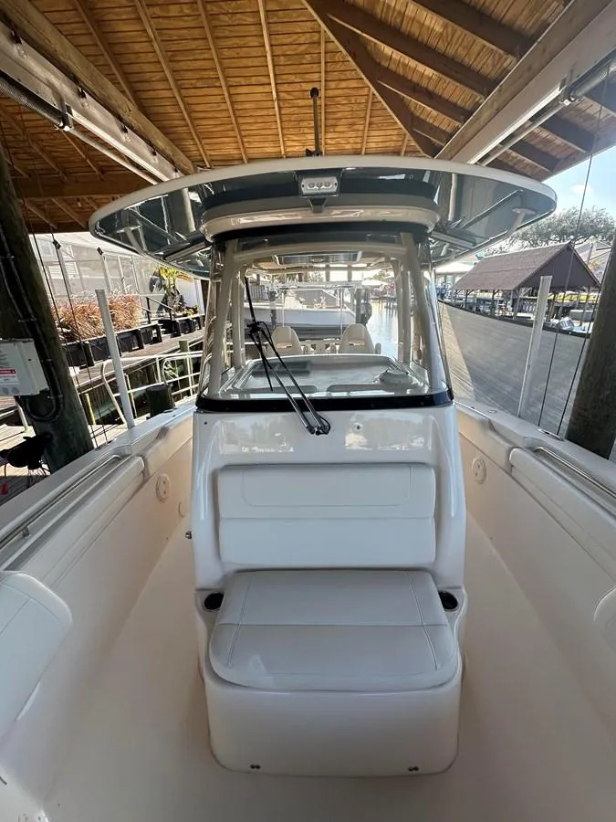 Slide: The Image of 2020 Grady-White Canyon 306 boat interior under wooden roof. - 11