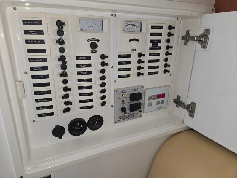 Slide: The Image of Electrical control panel on a 2002 Intrepid 377 Walkaround boat. - 17