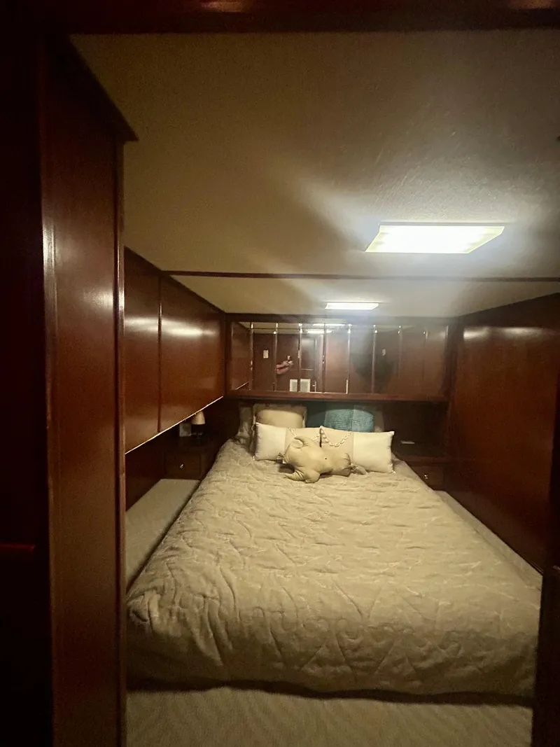 Slide: The Image of Cozy bedroom interior in 2001 Fantasy houseboat with wooden paneling and soft lighting. - 18