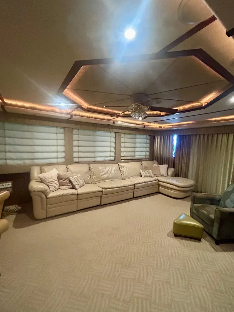 Slide: The Image of Luxurious interior of a 2001 Fantasy Houseboat with plush seating and elegant lighting. - 4