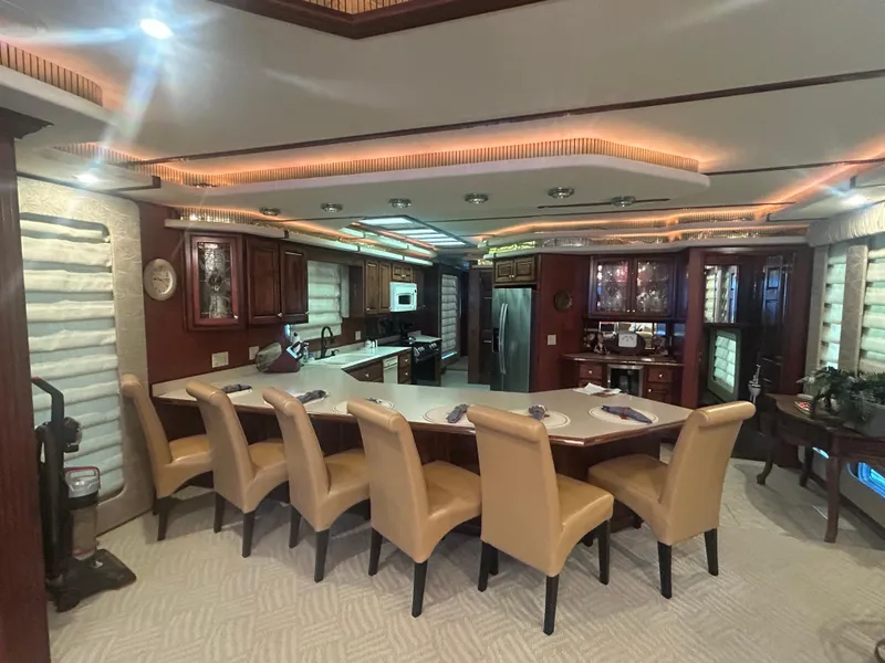 Slide: The Image of Luxurious 2001 Fantasy houseboat interior with modern kitchen and dining area. - 8