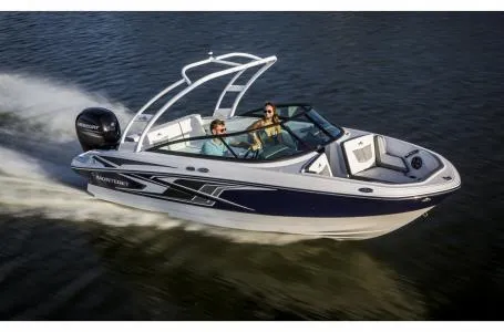Slide: The Image of 2018 Monterey M205 Bowrider speeding on water, showcasing sleek design and powerful performance. - 1