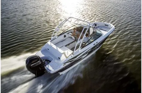 Slide: The Image of 2018 Monterey M205 Bowrider cruising on open water, showcasing sleek design and powerful engine. - 4