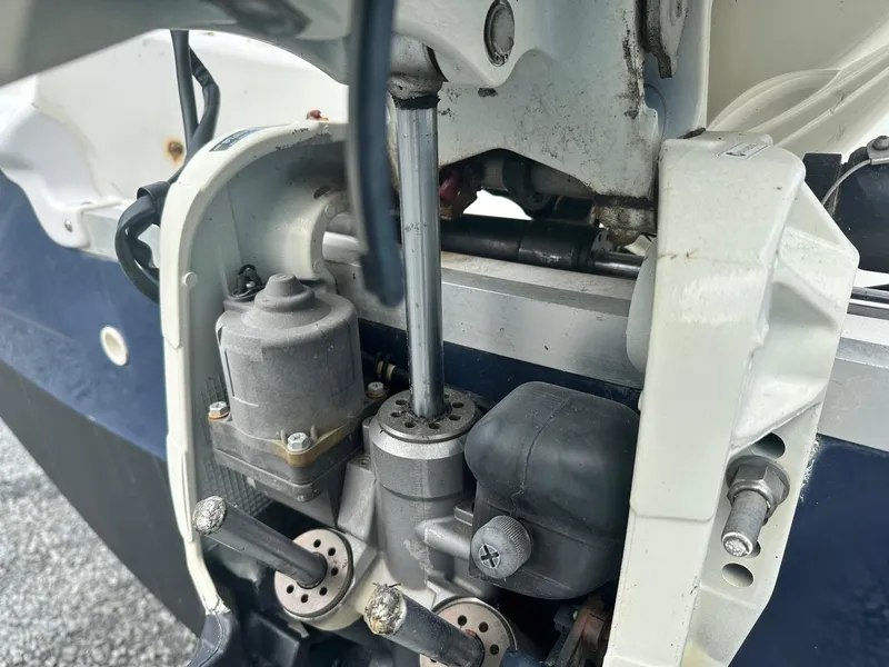 Slide: The Image of 2016 Godfrey Hurricane Sundeck SS211 Center Console engine components close-up. - 36